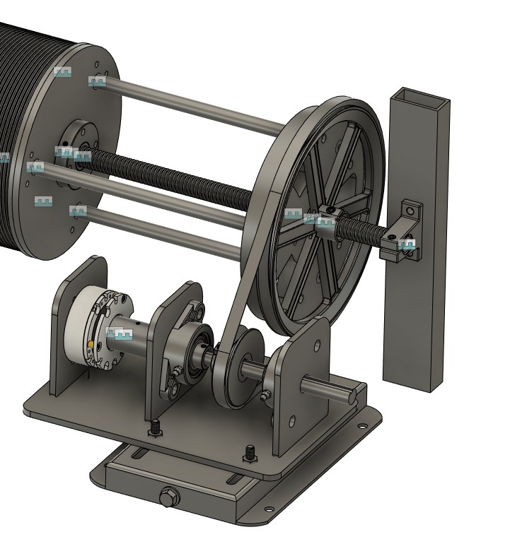 CAD close-up of the spool drive train: the spool and three rods turning with a large spoked pulley, a belt down to a small pulley on its own bearing-mounted shaft with a brake, on a slotted adjustable base